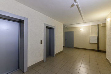 Russia, Moscow- February 10, 2020: interior public place, house entrance. doors, walls, staircase corridors