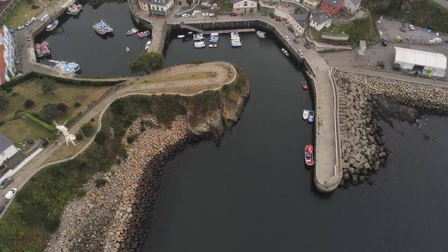 Harbour in Puerto de Vega. Coastal vilage of Asturias,Spain. Aerial Drone Footage