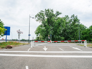 Strasbourg, Germany - May 9, 2020: Exit from Strasbourg with closed red barrier gate during COVID-19 coronavirus disease