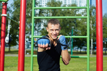 a boxer does training sessions in the morning on the sports field
