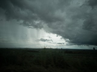 Obraz na płótnie Canvas Storm clouds over the land
