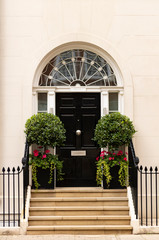 London/ United Kingdom - 07.31.2020: A close up of a door to a residential building in St James's,...