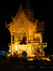 Fototapeta premium Lighting up a temple in Chiang Mai
