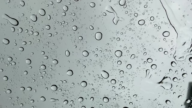rainning, droplet of water on Car mirror at Evening

