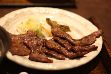 Close up of a plate of delicious grilled cow tongue, Okayama, Japan, soft focus