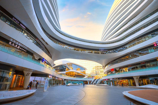 Beijing, China - Jan 12 2020: Galaxy Soho Building is an urban complex opened in 2014, designed by  architect Zaha Hadid. The complex offers shops, offices and entertainment facilities.
