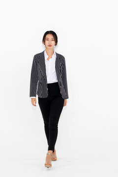 Asian Woman Full Body Portrait On White Background Wearing Formal Business Suit .