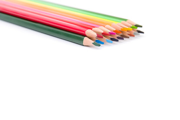 Colour pencils isolated on white background close up