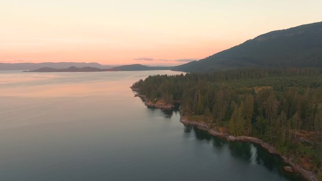 Aerial View of Mermaid Cove during a colorful summer sunrise. Taken in Saltery Bay, Sunshine Coast, British Columbia, Canada.