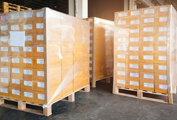 Shipment, Carton boxes, Cargo freight, Manufacturing warehouse storage. Stack of cardboard boxes or packages goods for delivering to a customer.
