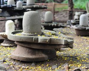 Close up of a stone sculpture of a Shiv ling