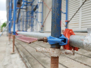 steel scaffolding at construction site with protection.