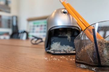 Mechanical Pencil sharpener on office table at work