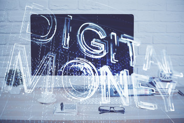 Double exposure of blockchain and crypto economy theme hologram and table with computer background....