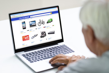 Fototapeta na wymiar Senior Man Shopping Consumer Gadgets Online