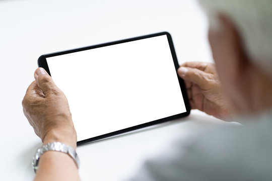 Elderly Senior Hand Using Tablet