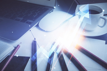 Computer on desktop with point up arrows hologram. Double exposure. Concept of success.