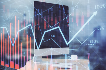 Stock market graph and table with computer background. Multi exposure. Concept of financial analysis.