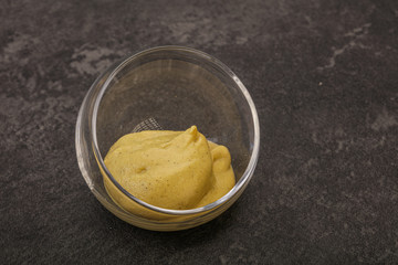 Dijon mustard sauce in the bowl