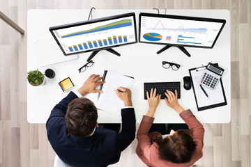 Financial Advisor And Business Analyst Working