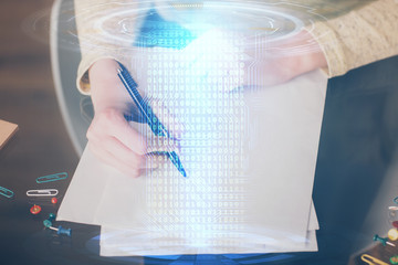 Double exposure of writing hand on background with data solution technology hologram. Ai concept.