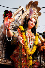 Sculpture of Hindu Goddess Durga, Goddess Durga idol with ornaments in close up side face view