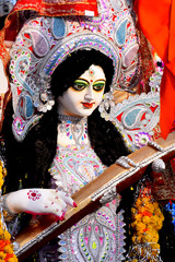 Sculpture of Hindu Goddess Durga, Goddess Durga idol with ornaments in close up side face view