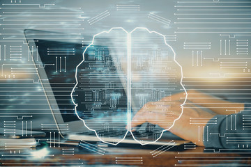 Man typing on keyboard background with brain hologram. Concept of big Data. Double exposure.