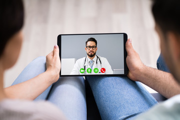 Pregnant Couple In Online Video Conference Call