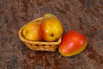 Pear heap in the wooden basket