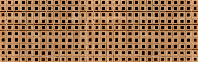 Panorama of Brown stone block wall seamless background and pattern texture