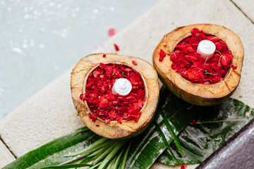 Rose blossom, Petals in coconut bowl, red flowers, candles, Beauty background