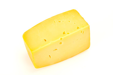 Hard yellow tasty cheese brick