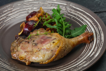 Roasted. duck. leg with plum and apple