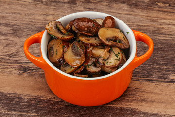 Roasted champignon with herbs and spices
