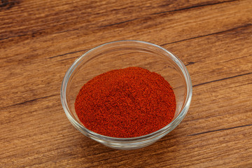 Dry paprika powder in the bowl