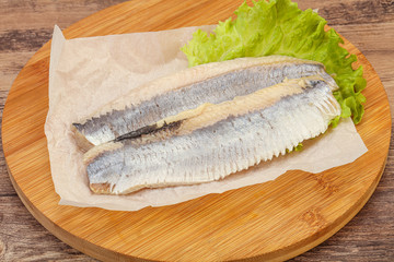 Herring fillet with salad leaves