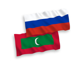 Flags of Maldives and Russia on a white background