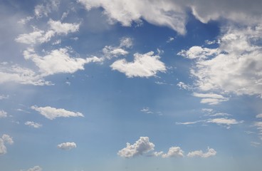 blue sky background with tiny clouds