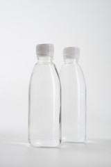 water bottle. fresh liquid food product on blank plastic container bottle mockup