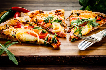 Pizza with smoked ham and pepper

