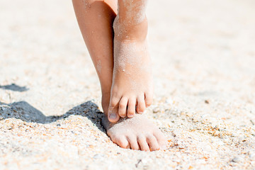 feet in the sand