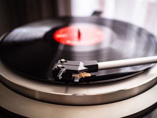 Turntable that plays a vinyl record