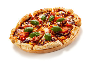 Pizza with ham, mozzarella, champignon and vegetables on white background
