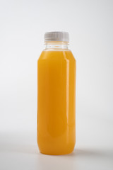 fresh liquid food product on blank plastic container bottle mockup. juice in a bottle or beverage product