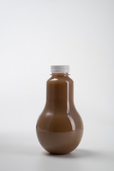 coffee product mockup on plastic bottle over white background