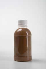 coffee product mockup on plastic bottle over white background