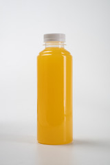 fresh liquid food product on blank plastic container bottle mockup. juice in a bottle or beverage product