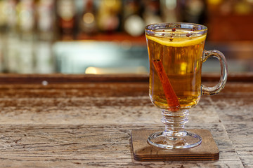 Non-alcoholic mulled wine in a glass with a handle