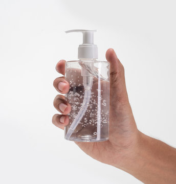 Gesture Of Hand Holding Plastic Bottle Hand Sanitizer Product Mockup